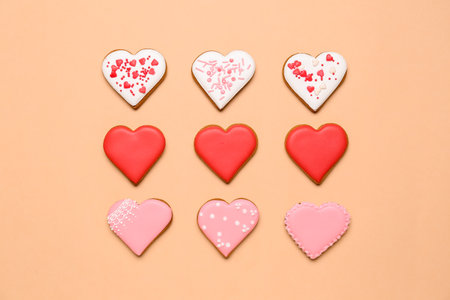 Composition with tasty heart shaped cookies on color background. Valentine's Day celebrationの写真素材