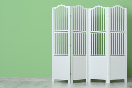 Modern folding screen near color wallの写真素材