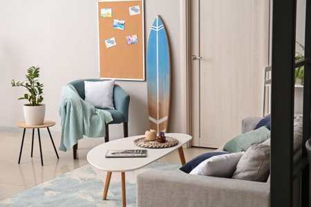 Interior of stylish room with surfboardの写真素材