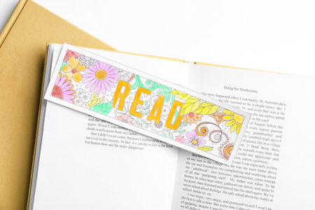 Cute bookmark with books on white backgroundの写真素材