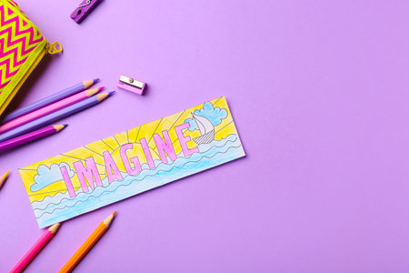 Cute bookmark with pencils on color background