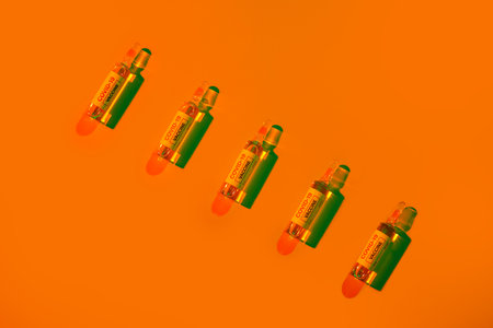 Vaccine for immunization against COVID-19 on color background