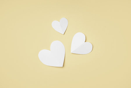Composition with paper hearts on color background. valentine's day celebrationの写真素材