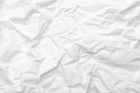 Texture of white crumpled paper, closeupの写真素材