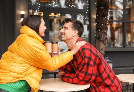 Happy young couple outdoors on winter dayの写真素材