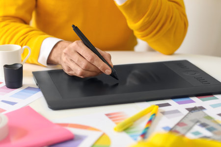 Graphic designer working in officeの写真素材