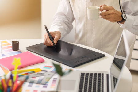 Graphic designer working in office