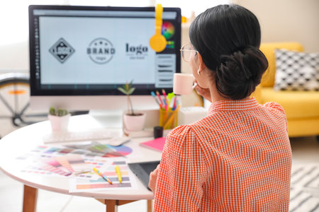Graphic designer working in officeの写真素材