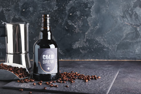 Composition with tasty cold brew and coffee beans on dark backgroundの写真素材