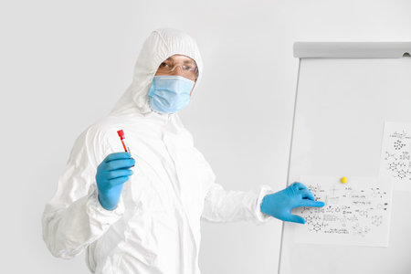 Scientist working with sample in laboratory