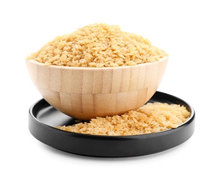 Bowl with raw stelline pasta on white backgroundの写真素材