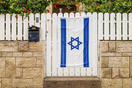 Door with flag of Israel on streetの写真素材