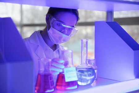 Scientist developing covid-19 vaccine in laboratory