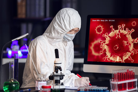 Scientist developing covid-19 vaccine in laboratory