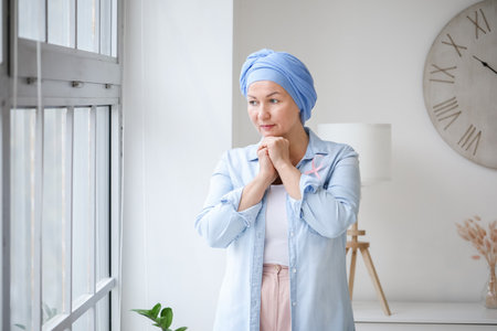 Mature woman after chemotherapy at home