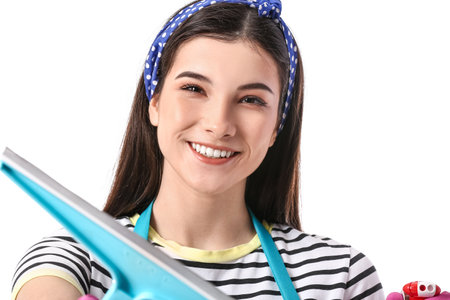 Young woman with squeegee on white background