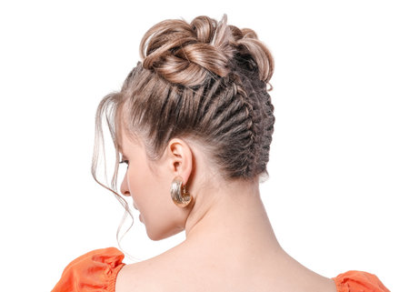 Beautiful young woman with braided hair on white background