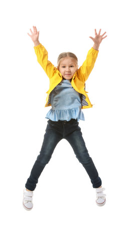 Jumping little girl on white background