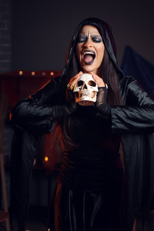 Witch performing black magic ritualの写真素材