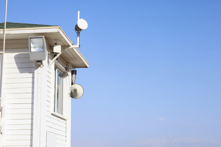 View of lifeguard house against blue skyの写真素材