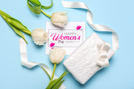 Composition with gift box, greeting card and beautiful tulip flowers for Women's Day celebration on color backgroundの写真素材