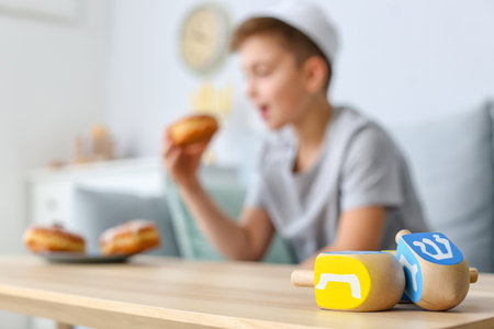 Dreidels for Hannukah on tableの写真素材