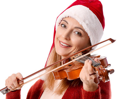 Mature woman playing violin on white backgroundの写真素材