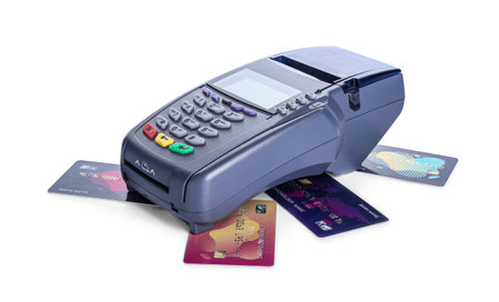 Payment terminal with credit cards on white background
