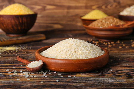 Plate with rice on wooden backgroundの写真素材