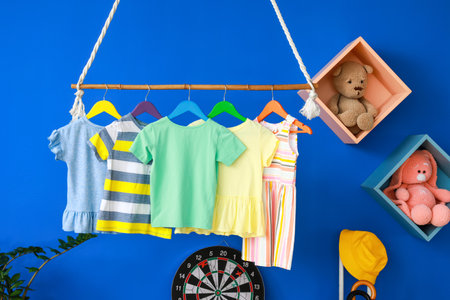 Rack with clothes in the interior of the children's roomの写真素材