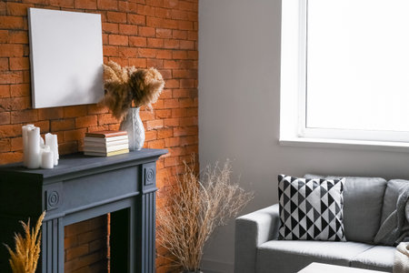 Interior of stylish living room with fireplaceの写真素材