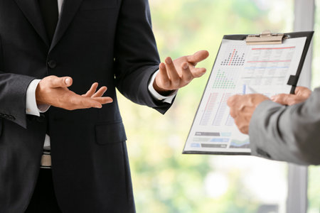 young businessmen working in officeの写真素材