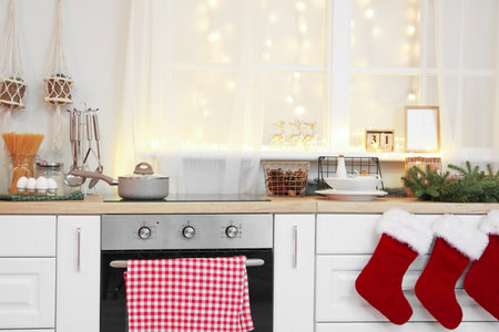 Interior of modern kitchen decorated for Christmasの写真素材