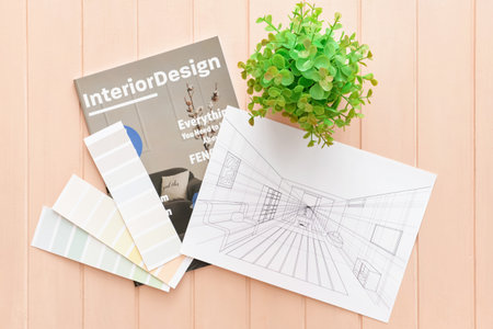House plan, color palettes and magazine on color wooden backgroundの写真素材