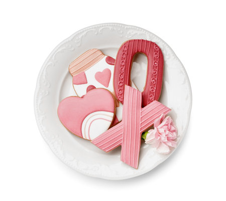 Plate with sweet cookies and carnation flower on white background. Valentine's Day celebrationの写真素材