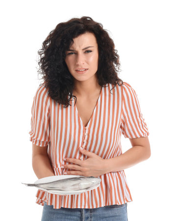 Young woman with food allergy on white backgroundの写真素材
