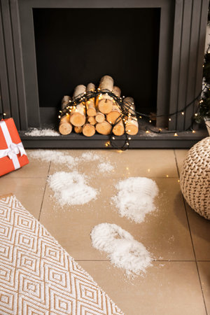 Footprints of Santa on floor in roomの写真素材