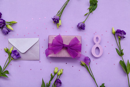 Envelope, number 8, eustoma flowers and gift for Women's Day celebration on lilac background