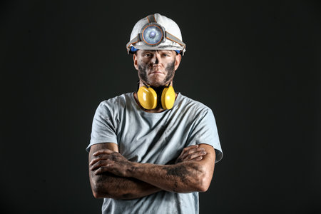 Miner man on dark background
