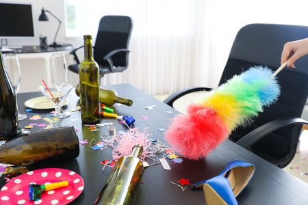 Cleaning messy office after party