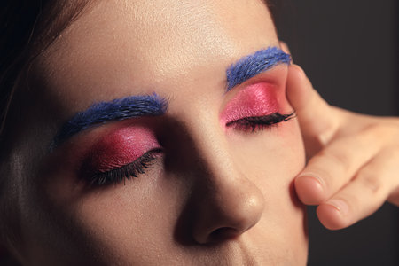 Beautiful woman with unusual makeup, closeup