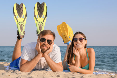 happy young couple on sea beachの写真素材