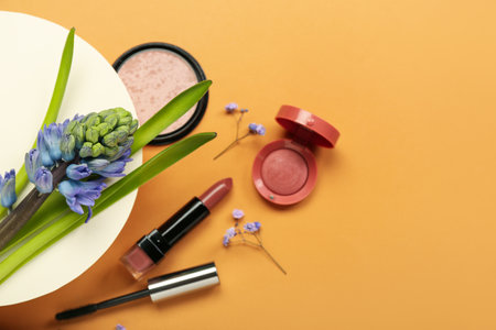 Composition with hyacinth flower and cosmetics on color backgroundの写真素材