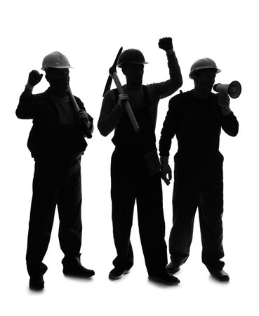 Silhouette of protesting miner men on white backgroundの写真素材