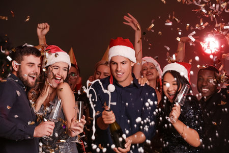 Young people celebrating New Year in night clubの写真素材