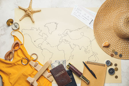 Set of travel items on world mapの写真素材