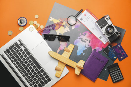 Set of travel items on color background