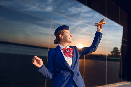Portrait of young stewardess outdoorsの写真素材