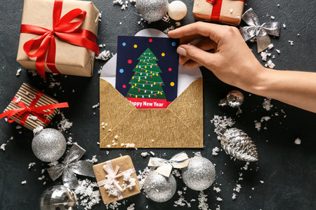 Beautiful greeting card for New Year celebration on dark backgroundの写真素材