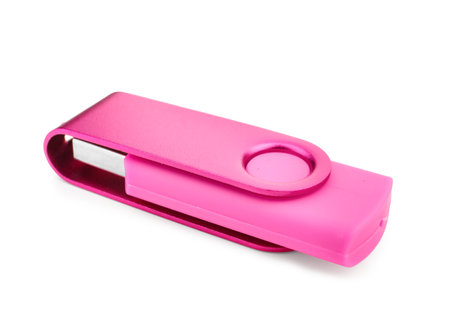 Pink USB flash drive on white background